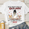Never Underestimate An Old Lady Who Loves Dogs - Personalized Unisex T-Shirt