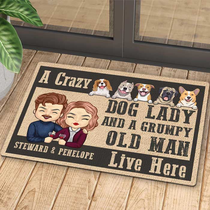 A Crazy Dog Lady And Her Grumpy Old Man Live Here -  Personalized Decorative Mat
