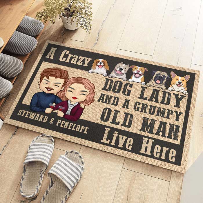 A Crazy Dog Lady And Her Grumpy Old Man Live Here -  Personalized Decorative Mat