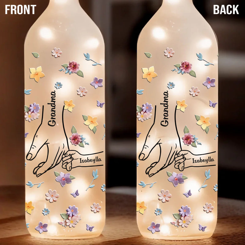 A Mother’s Hands Cradle The World While Filling It With Love - Family Personalized Custom Bottle Lamp - Gift For Mom, Grandma