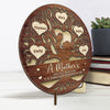A Mother's Love Is The Heart Of A Family - Family Personalized Custom 2-Layered Wooden Plaque With Stand - House Warming Gift For Mom
